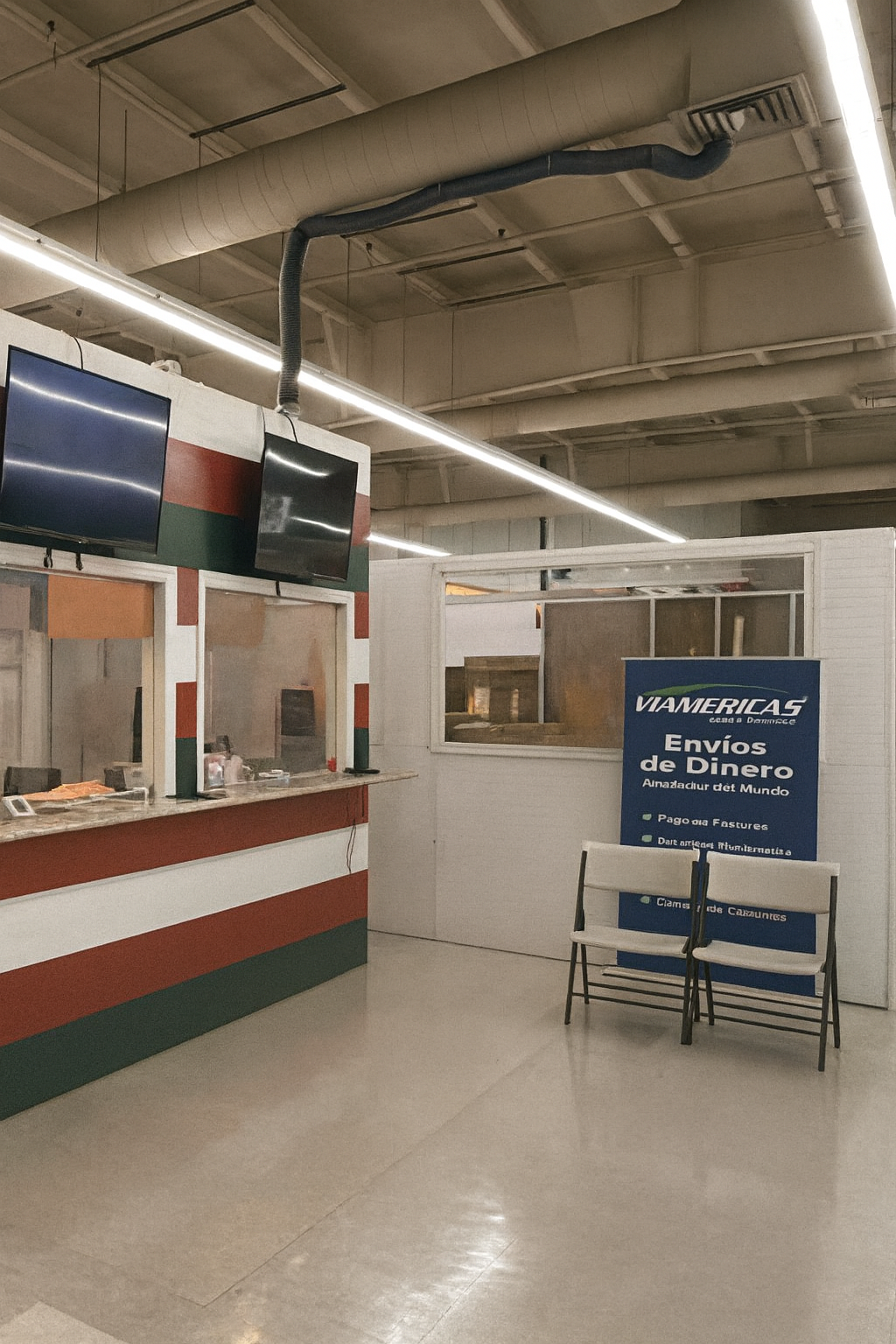 Tan commercial building with a blue sign that reads 