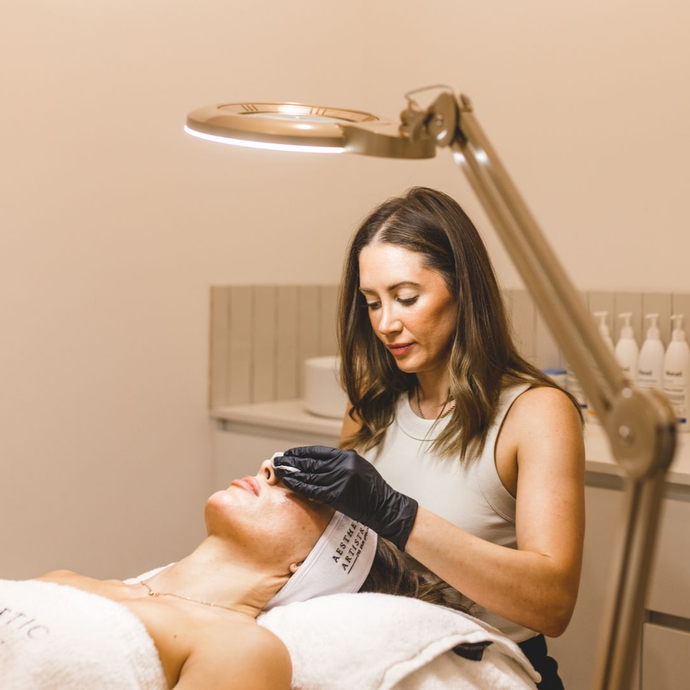 Tijan treating a client
