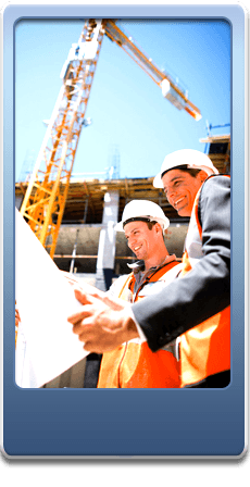 Two workmen looking at a building plan