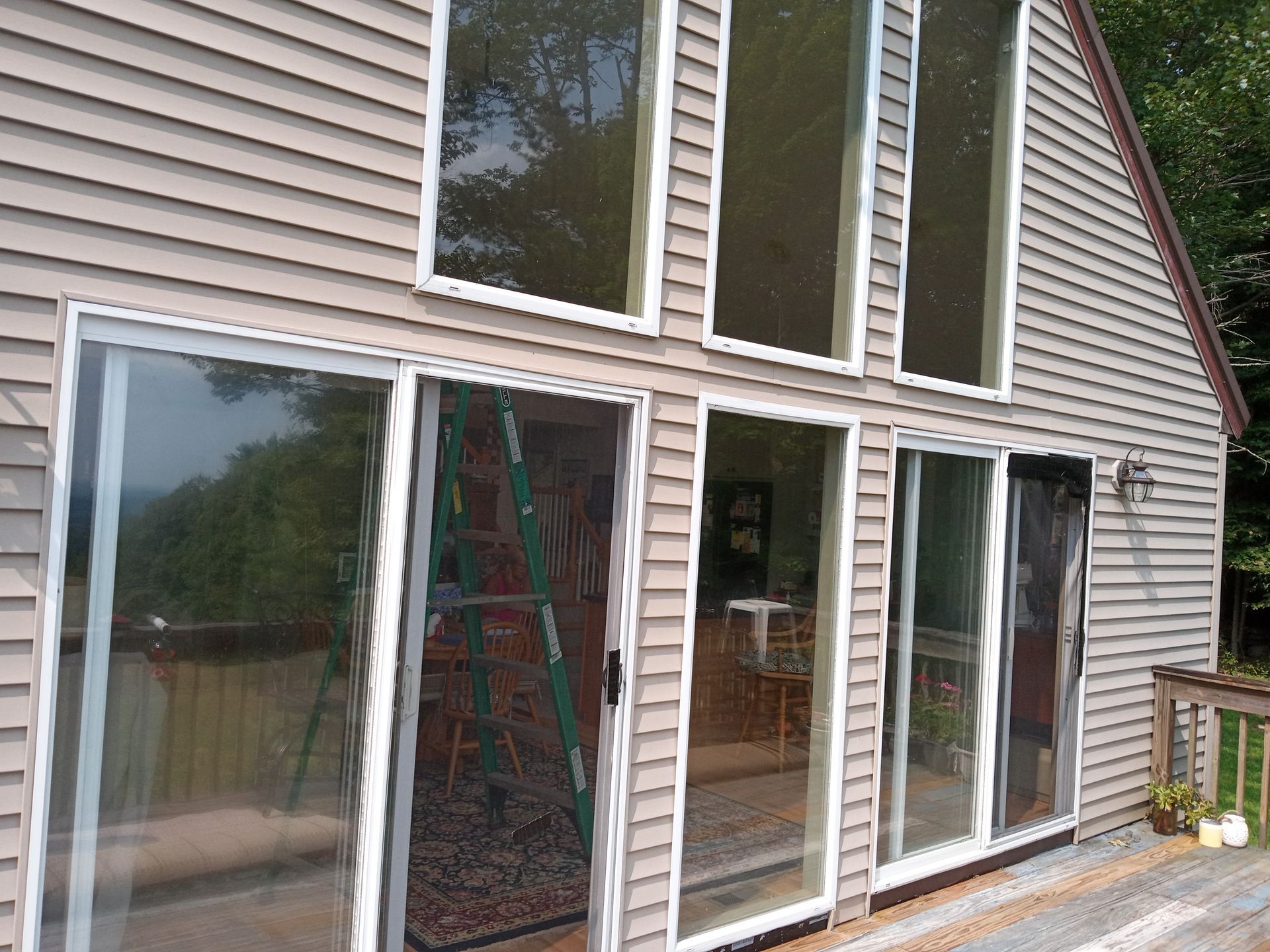 A wooden structure is being built next to a swimming pool.