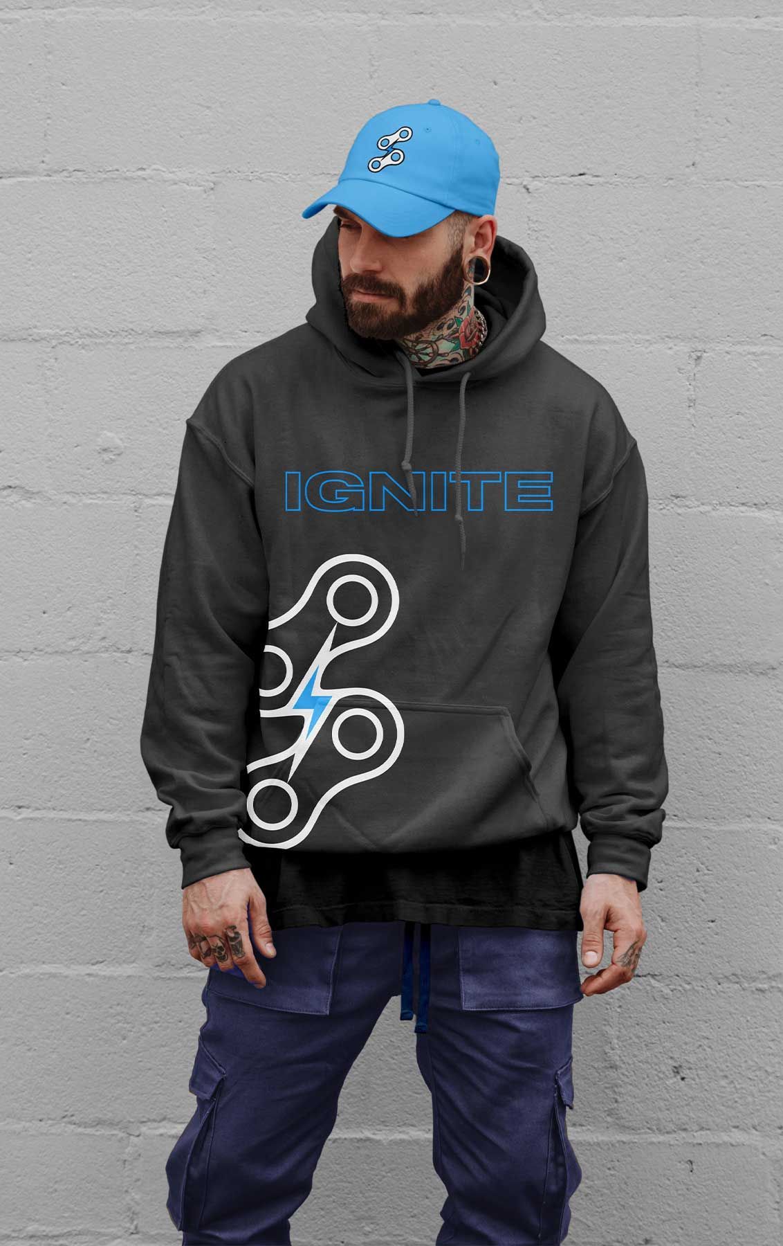 IGNITE Powersports apparel mockups featuring custom motorcycle branding with a man wearing a grey hoodie with the IGNITE logo