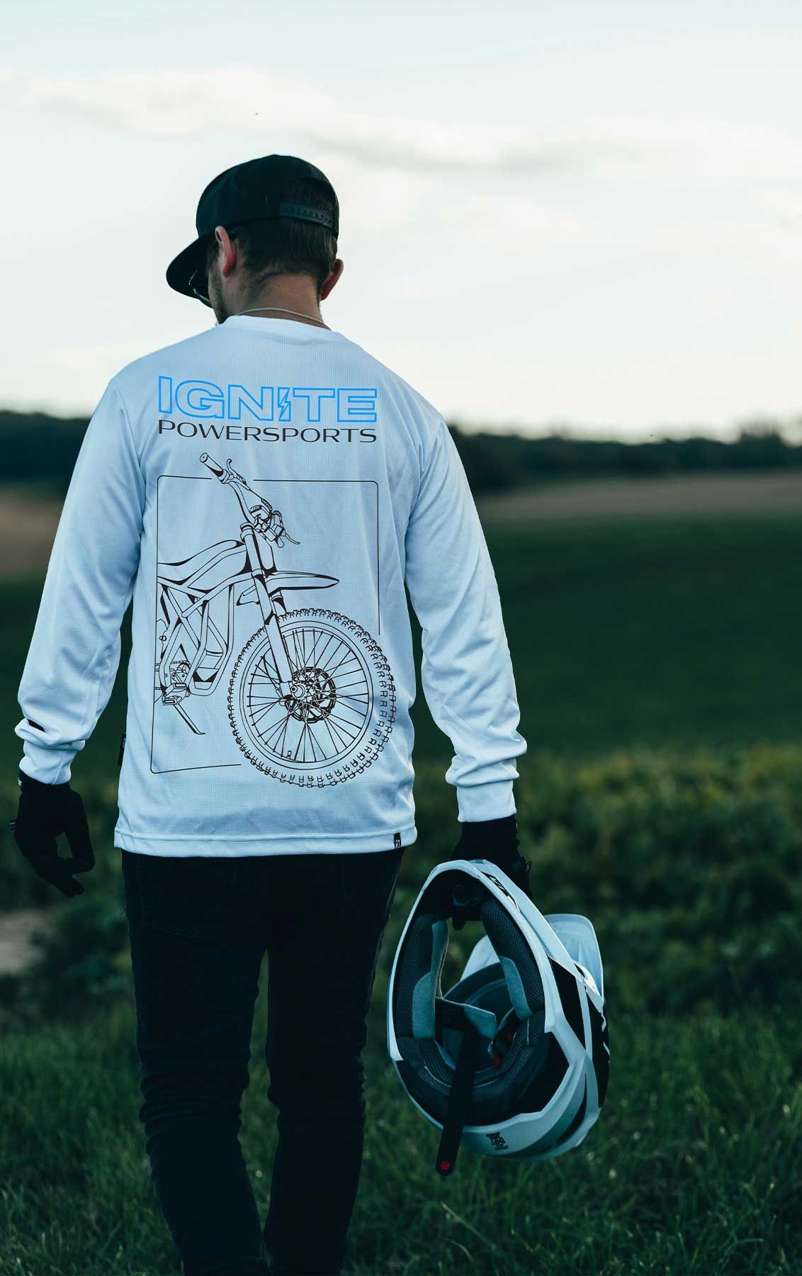 custom motorcycle branding with a man wearing a long sleeve tee with the IGNITE logo