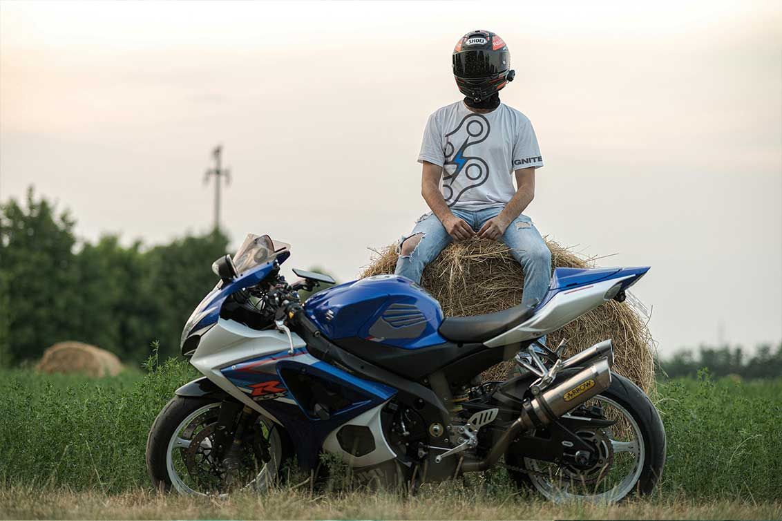 IGNITE Powersports apparel mockups featuring custom motorcycle branding with a man wearing a white tshirt with the IGNITE logo