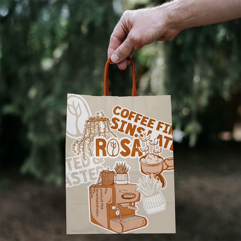 ROSA packaging and sticker mockups styled with fresh foliage.