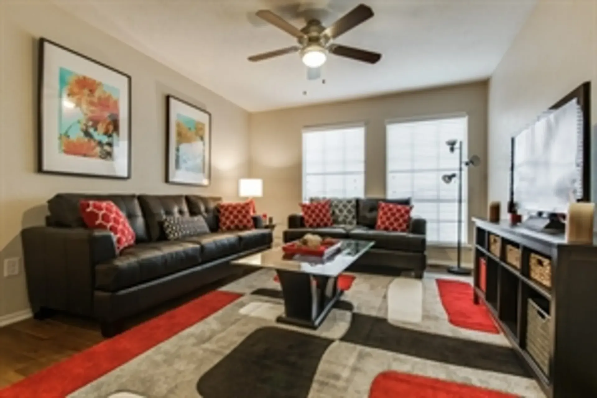 photo of a living room  with ceiling fan