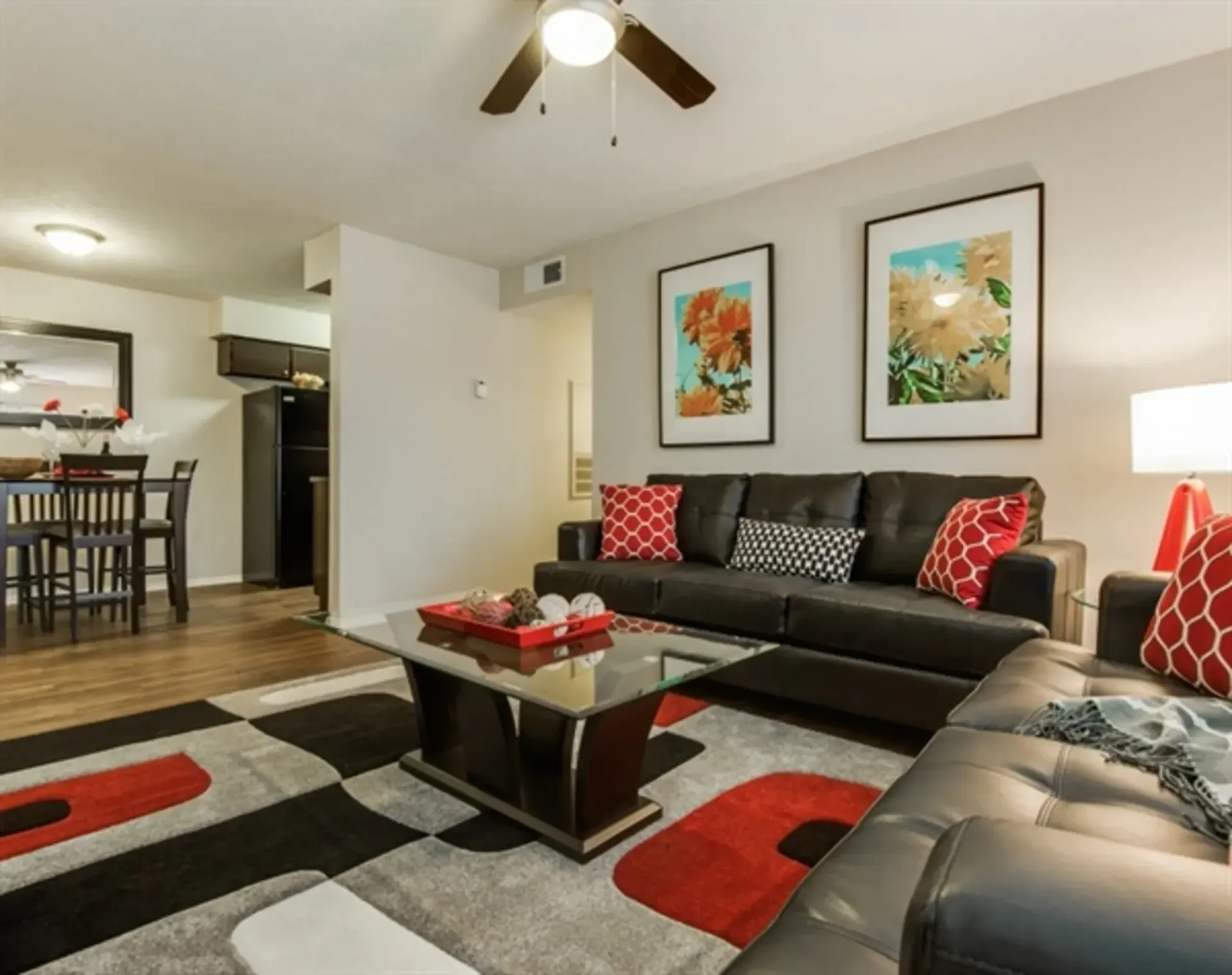 photo of a living room  with ceiling fan alternate angle