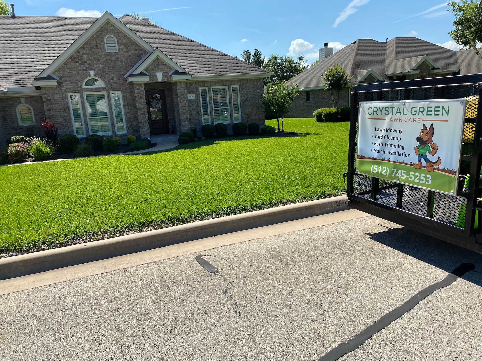 a house with a sign in front of it that says crystal green