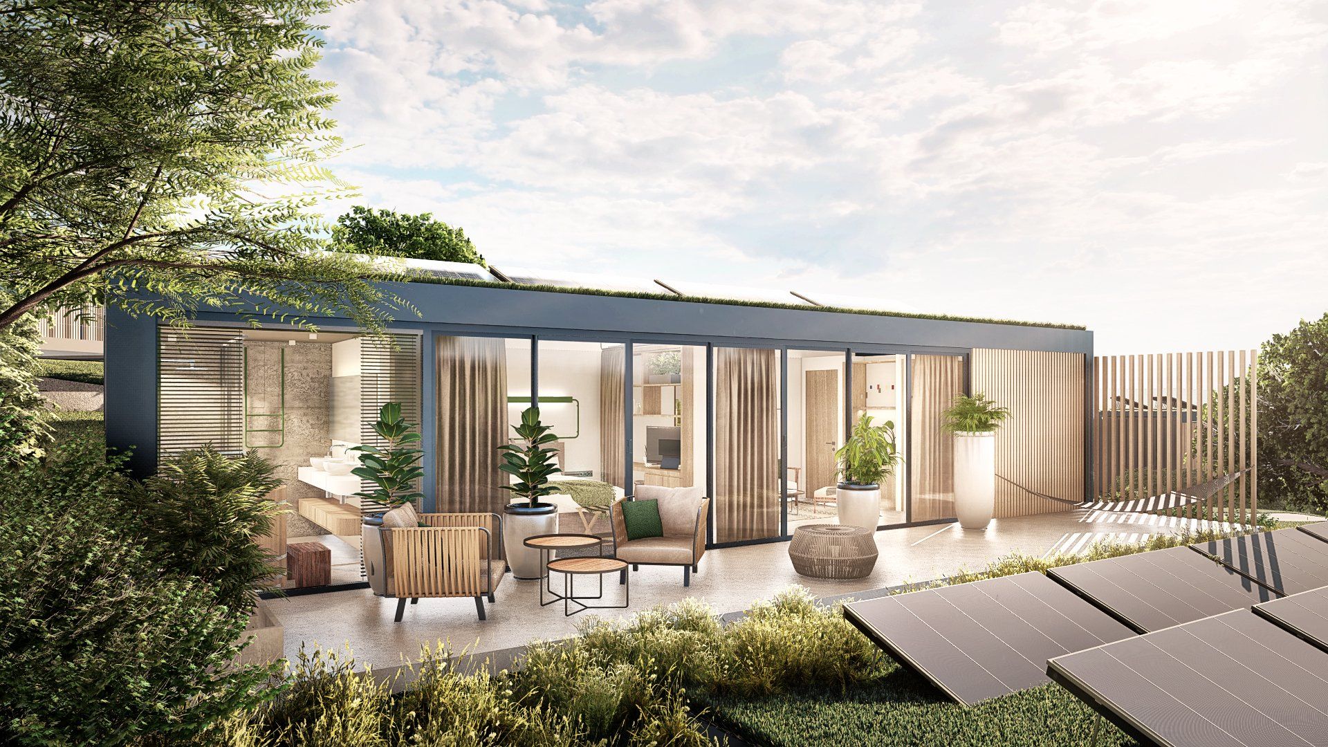 Modern home with solar panels, outdoor seating, and greenery.