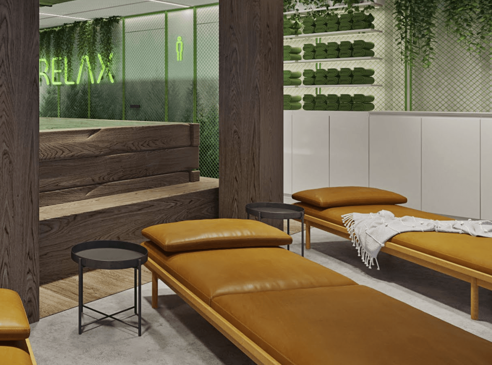 Spa interior with tan chaise lounges, the word 