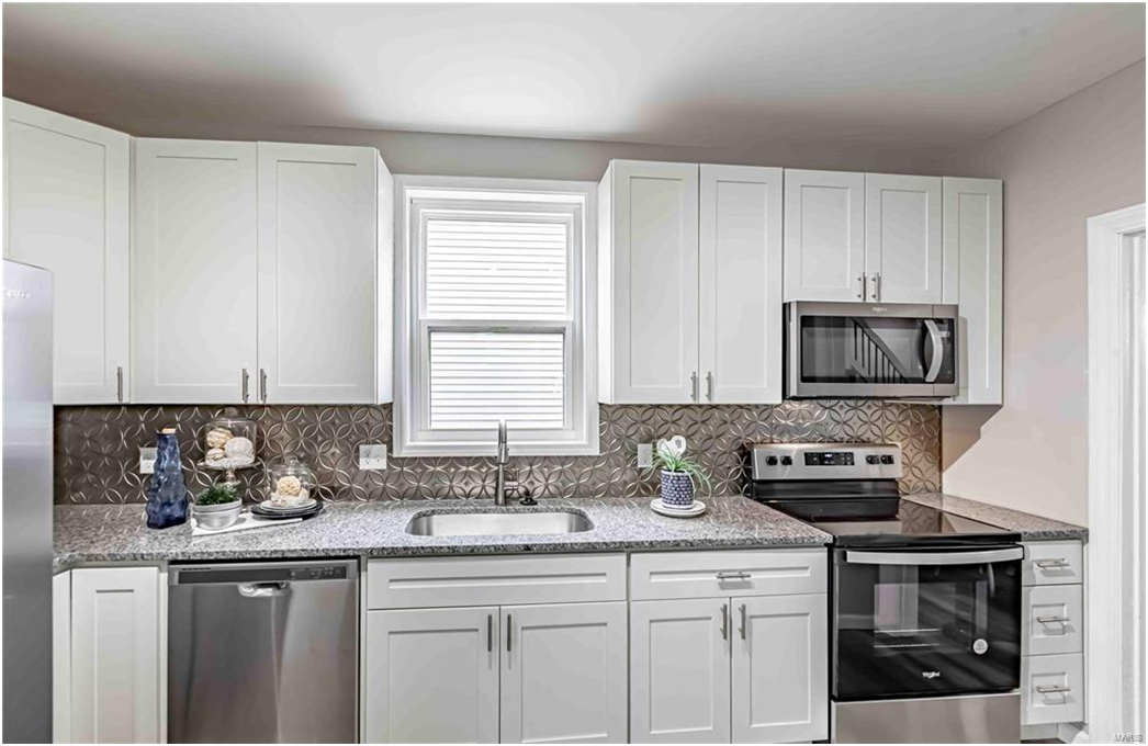White Kitchen Design 17 — Earth City, MO — Cabinets & Granite, Inc.