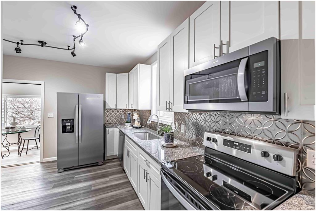 White Kitchen Design 13 — Earth City, MO — Cabinets & Granite, Inc.