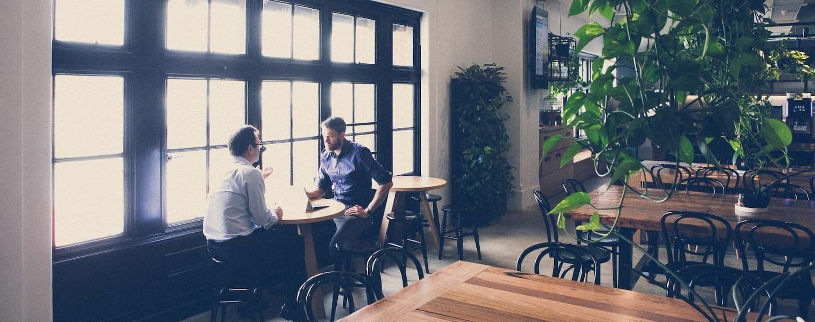 A Man and a Woman Are Sitting on a Couch in a Living Room — Search Partners in Melbourne, VIC