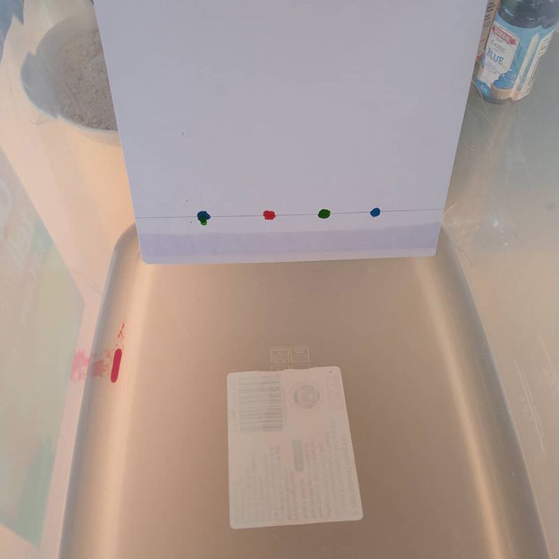 A Piece of Paper is Sitting on Top of a Metal Tray for Chemistry Experiment — The Molecule Mentor in Lorn, NSW