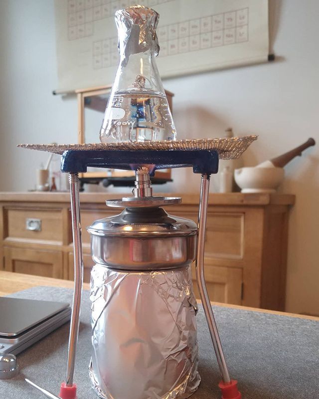 A Table With a Bottle and a Pot on It — The Molecule Mentor in Lorn, NSW