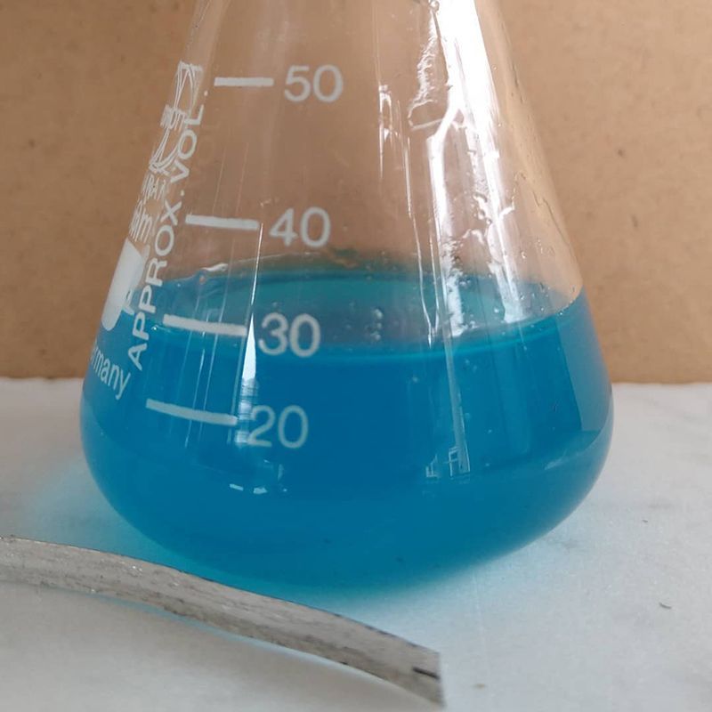 A Beaker Filled With Blue Liquid Has the Number 50 on It — The Molecule Mentor in Lorn, NSW