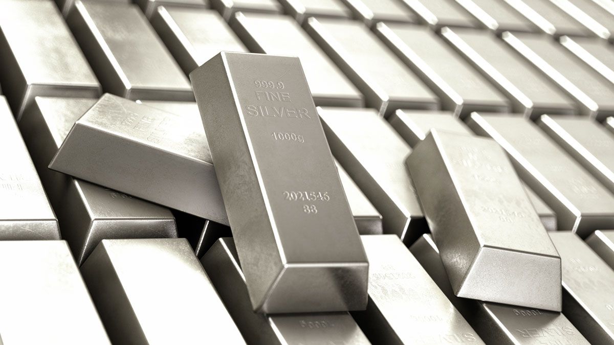A bunch of silver bars stacked on top of each other