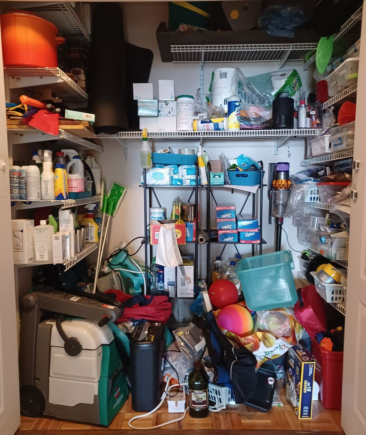 utility and cleaning closet disorganized, challenging area