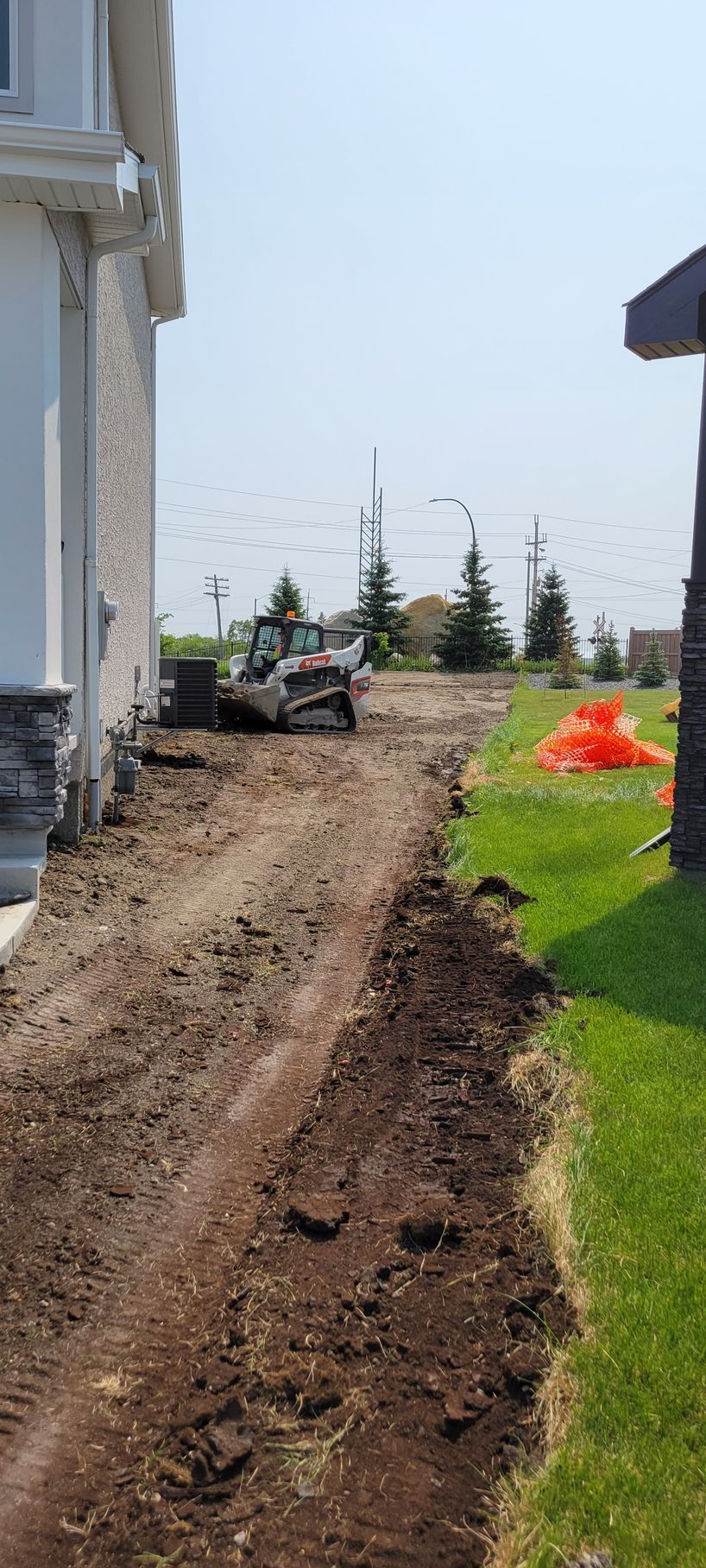 Land grading and soil preparation for new hydroseeding project
