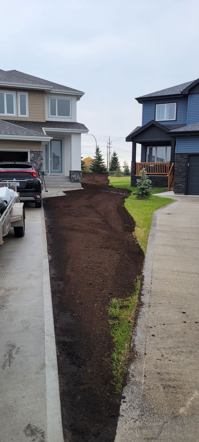 Land grading and soil preparation for new hydroseeding project