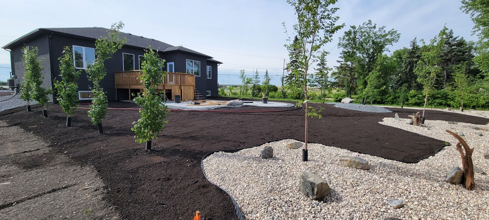 Land grading and soil preparation for new hydroseeding project