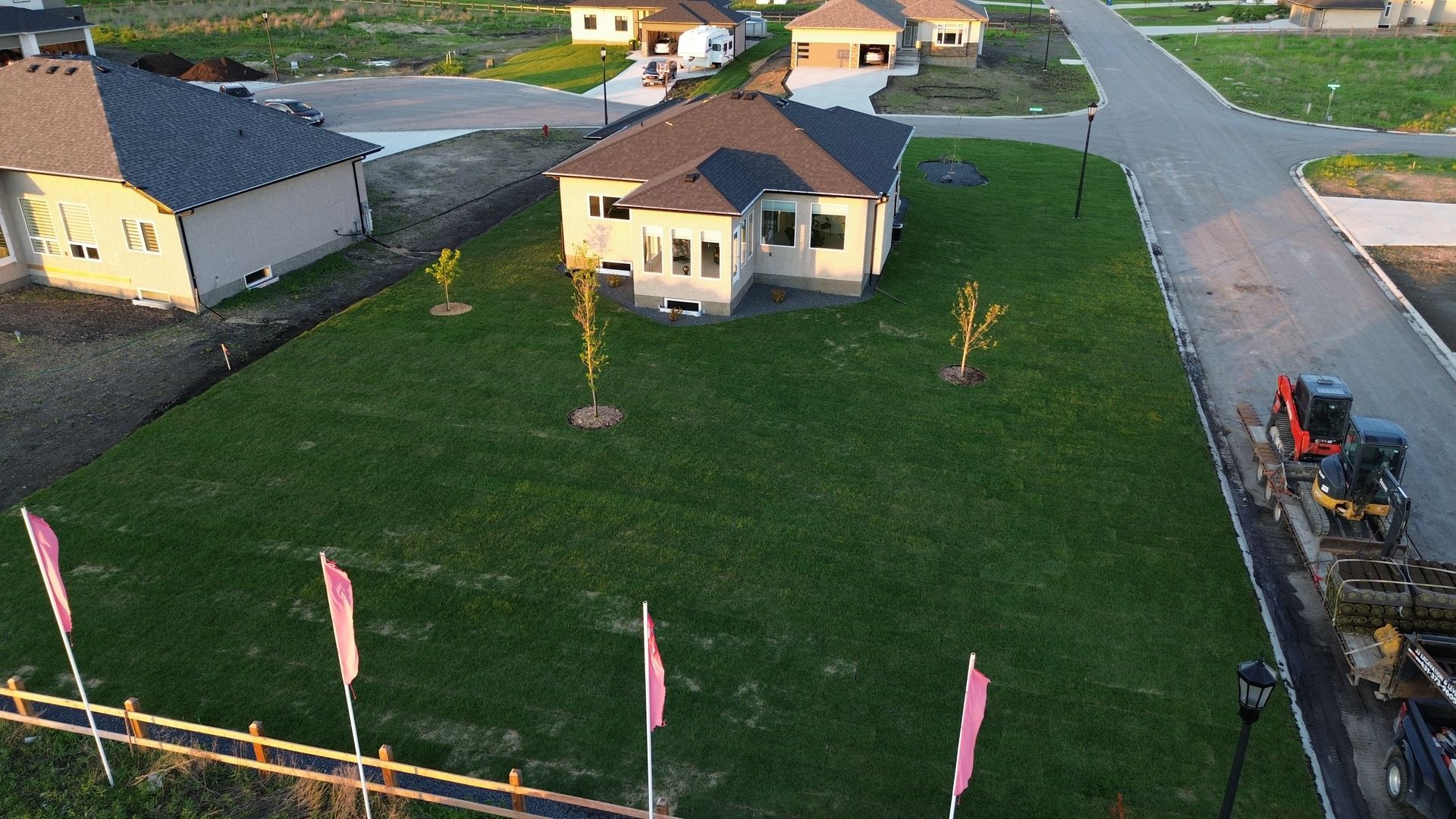 Before and after hydroseeding results in Winnipeg - thick green lawn