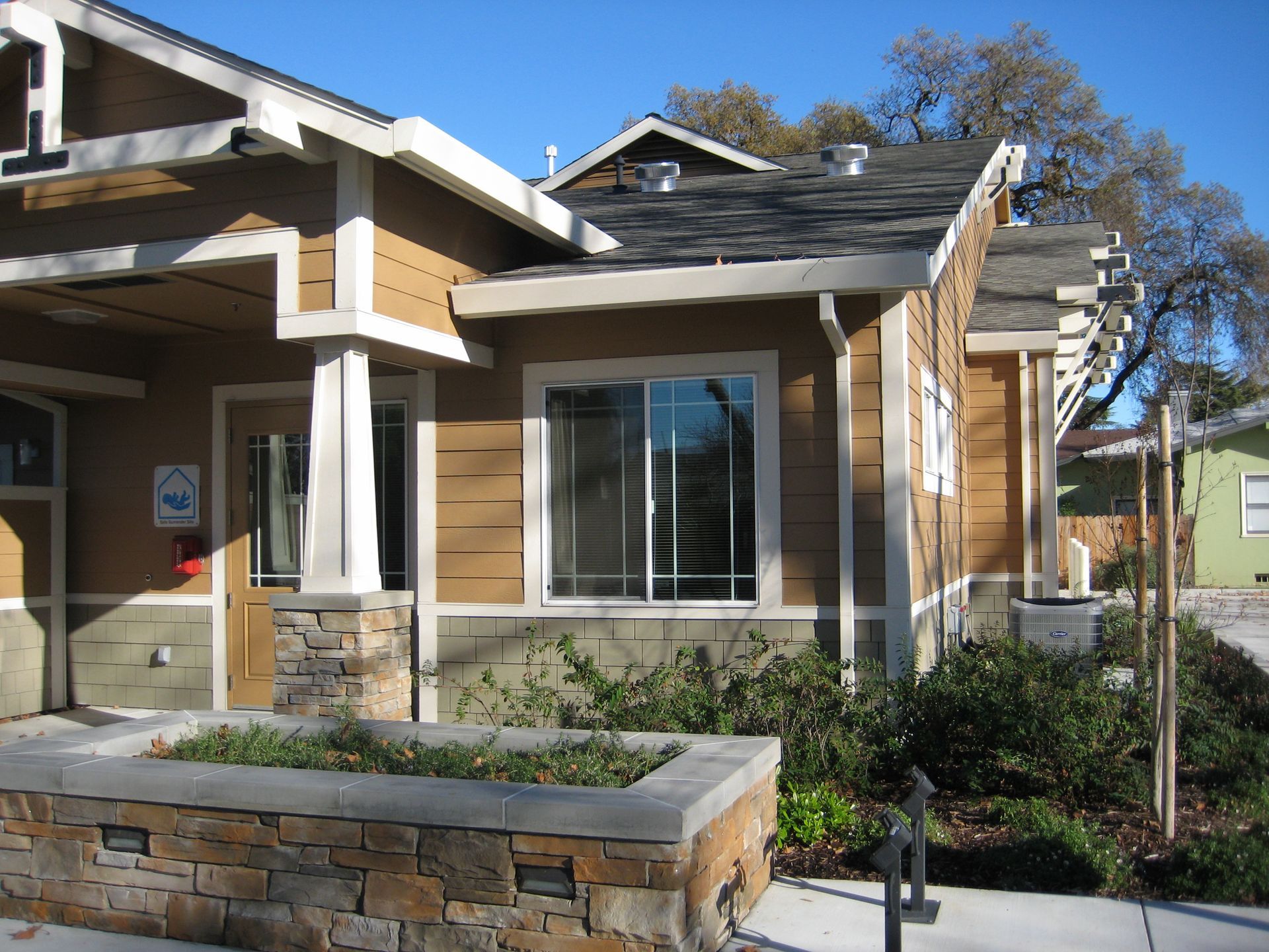 a house with a sign that says no parking
