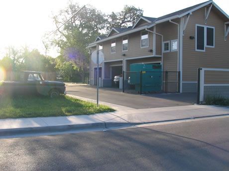 a house with a truck parked in front of it