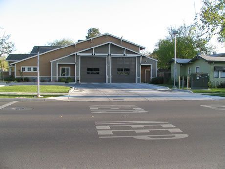 a house with a handicapped parking sign in front of it