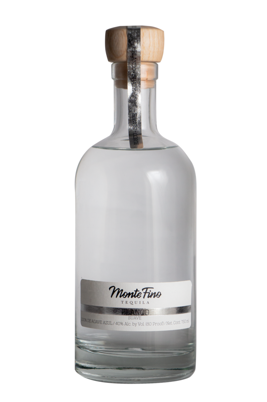 Bottle of Monte Toro tequila with a wooden cap and silver label.