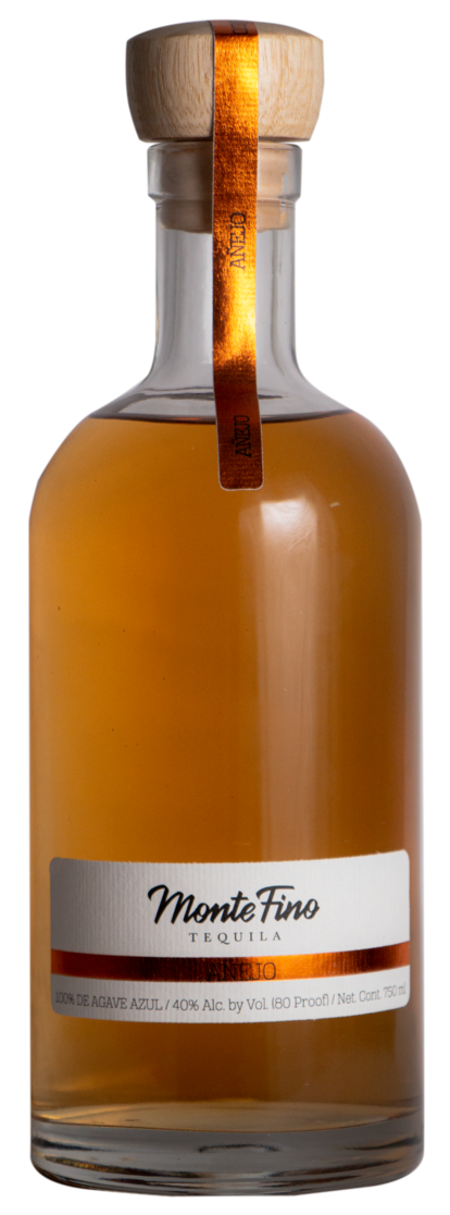 Bottle of Monte Fino Tequila with a cork and label.