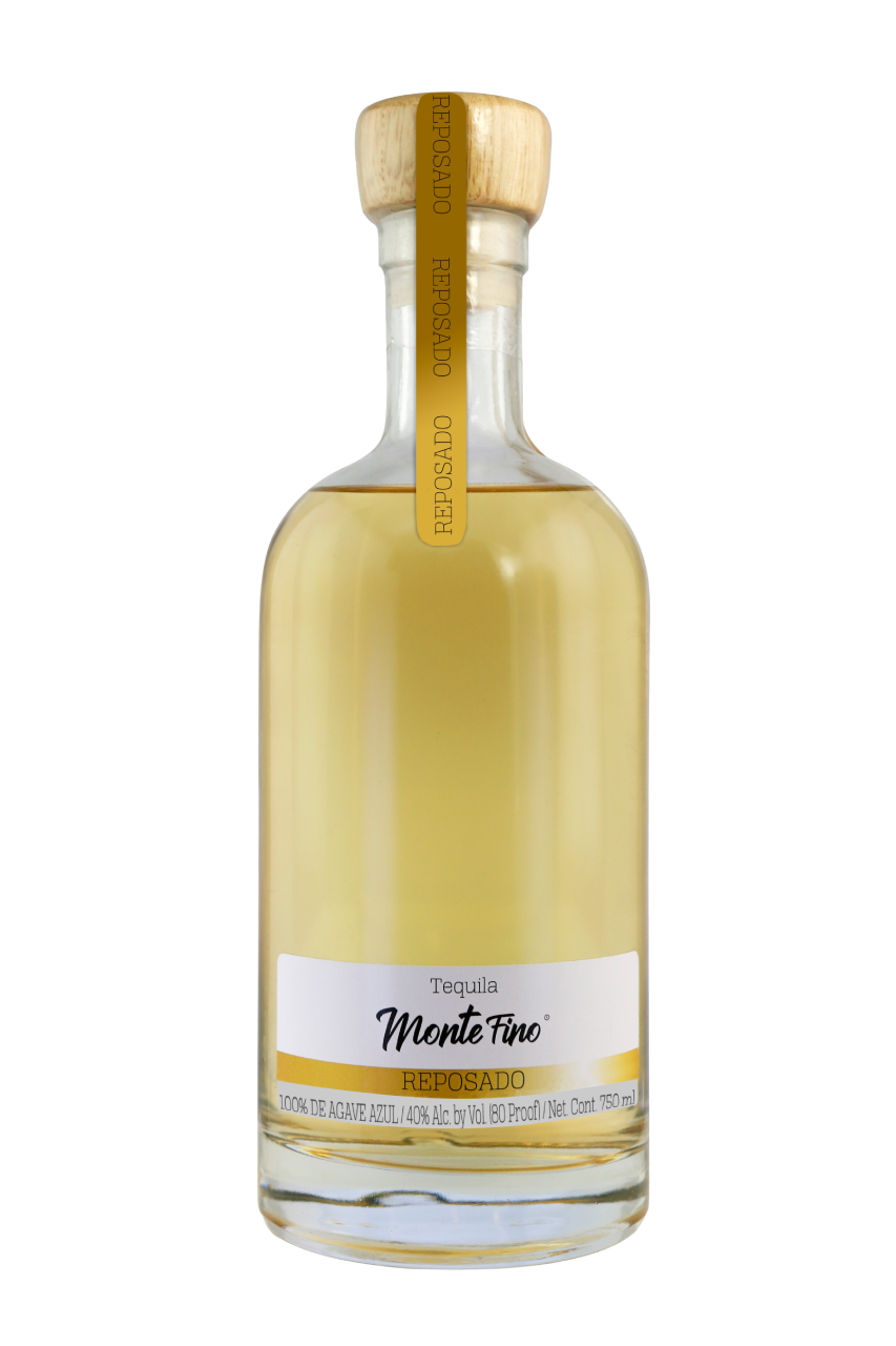 Bottle of Monte Fino Fino tequila with a clear glass bottle, wooden cork, and white label.