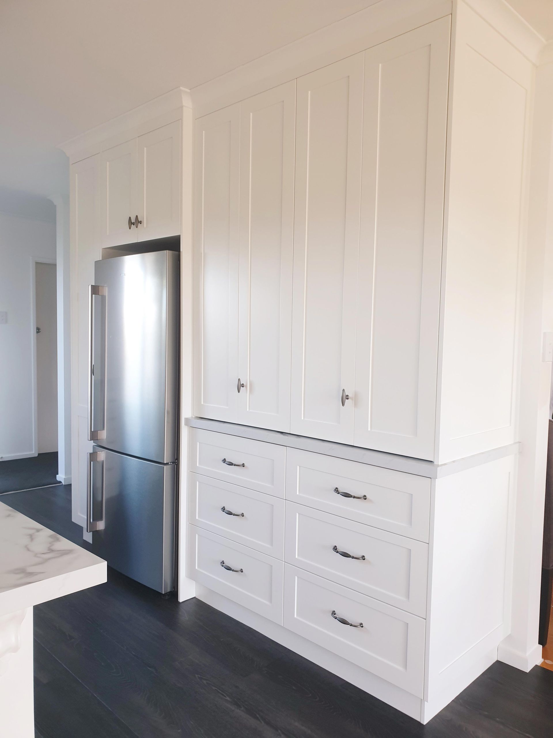A Kitchen With White Cabinets And Drawers — Motueka, NZ — Motueka Joinery Co.