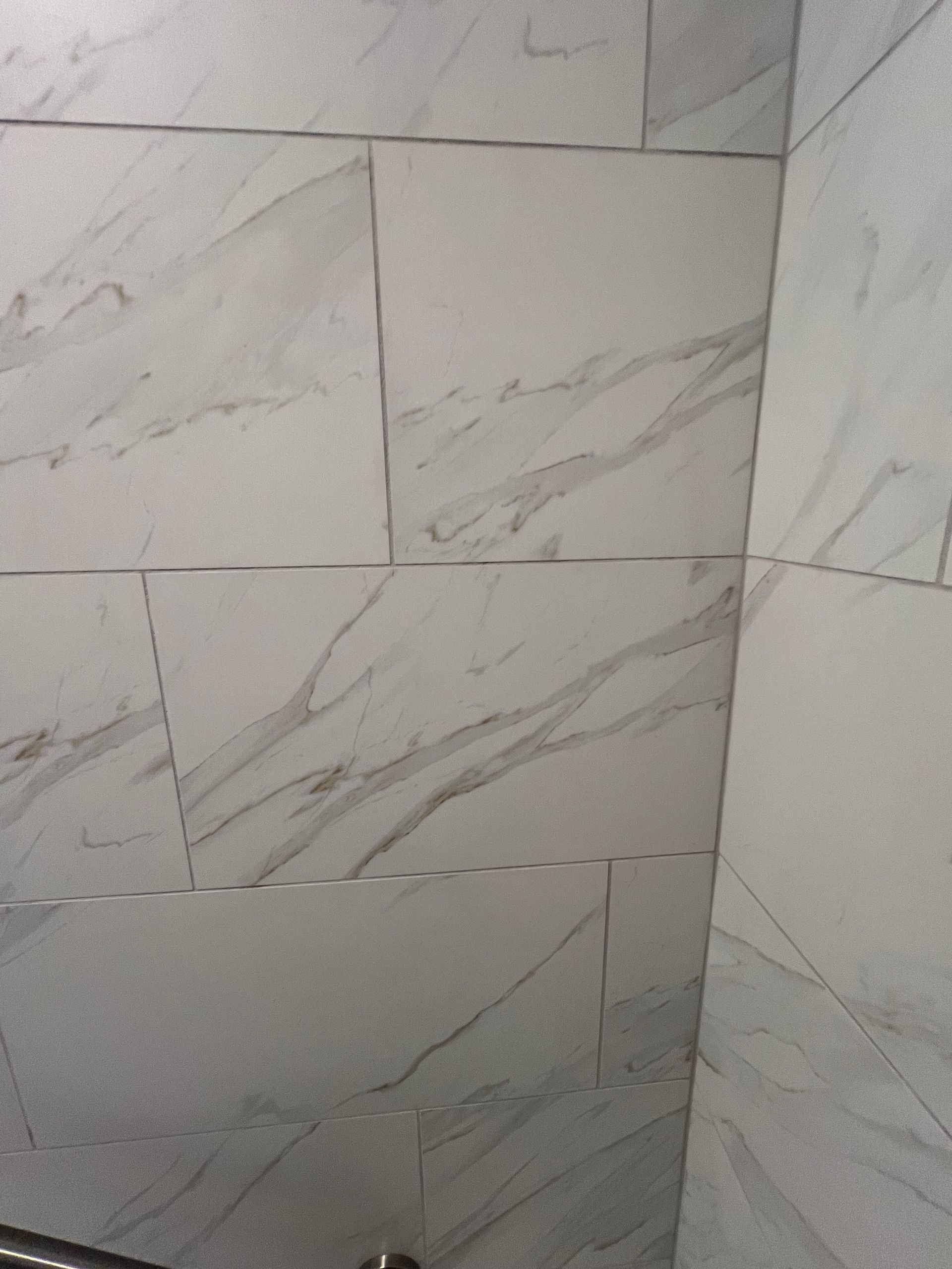 White and gray marble tile wall.