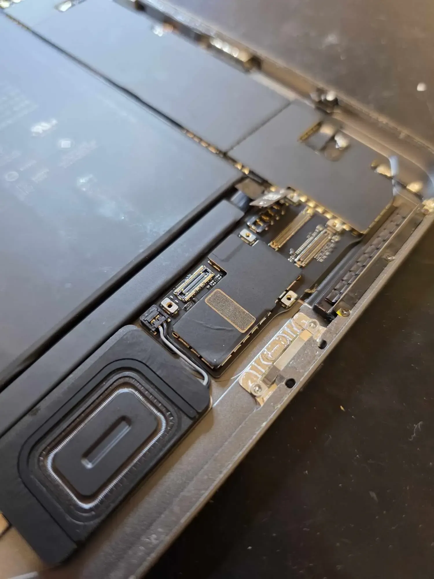 An iPad repair in progress