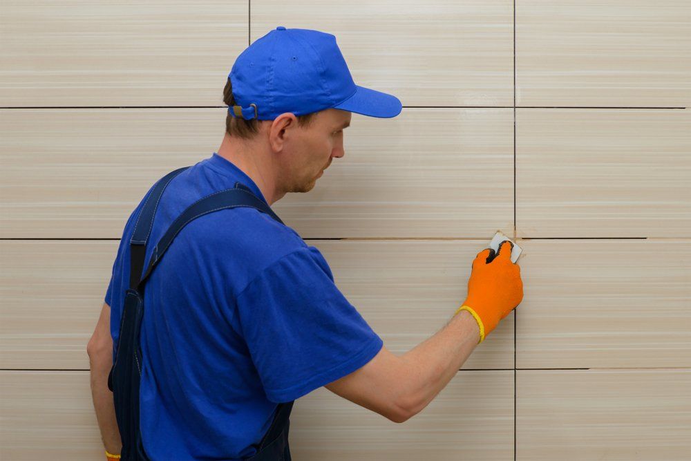 Grout Cleaning — Man Cleaning Grout in Ipswich, MA