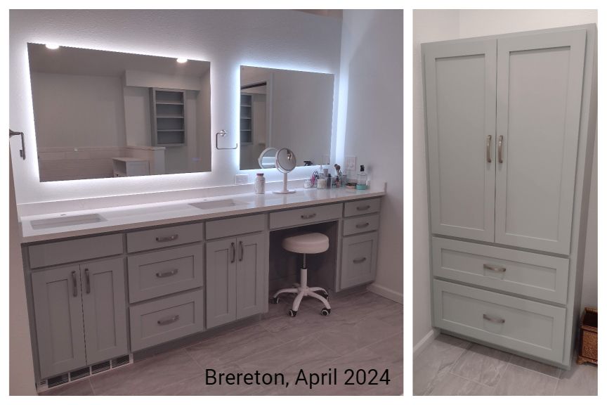 A bathroom with two sinks , a large mirror and a cabinet.