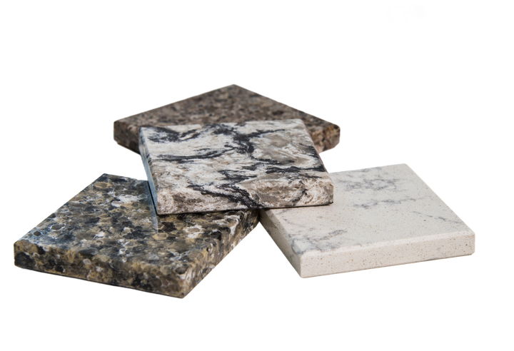 four different types of marble are stacked on top of each other on a white background .