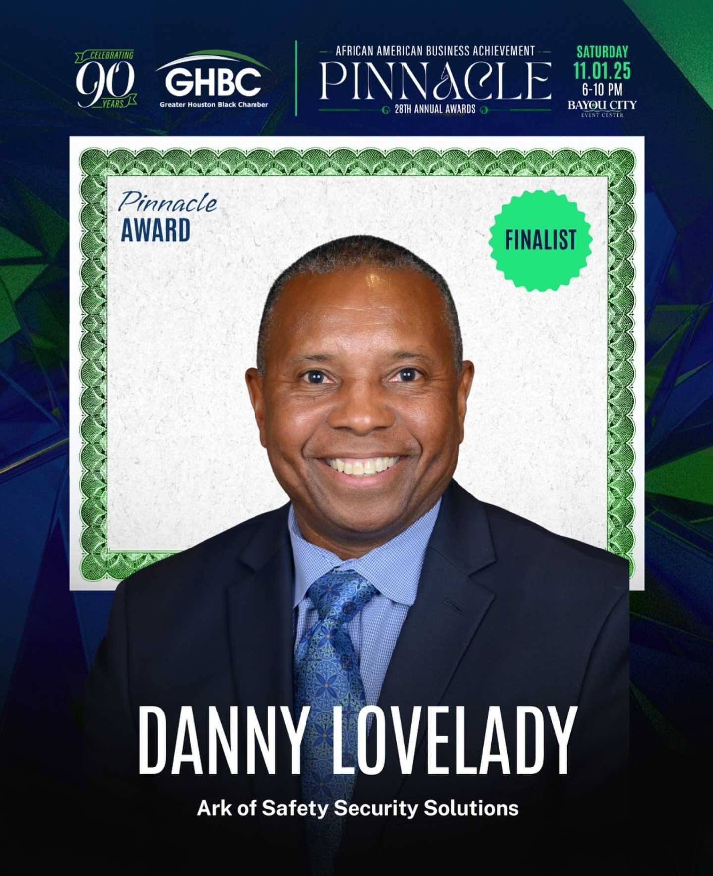 Man smiling in a suit, labeled 