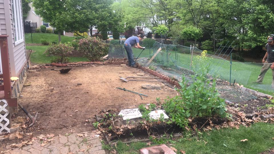 Man Designing Backyard Landscaping — Shrewsbury, MA — Warren Landscaping