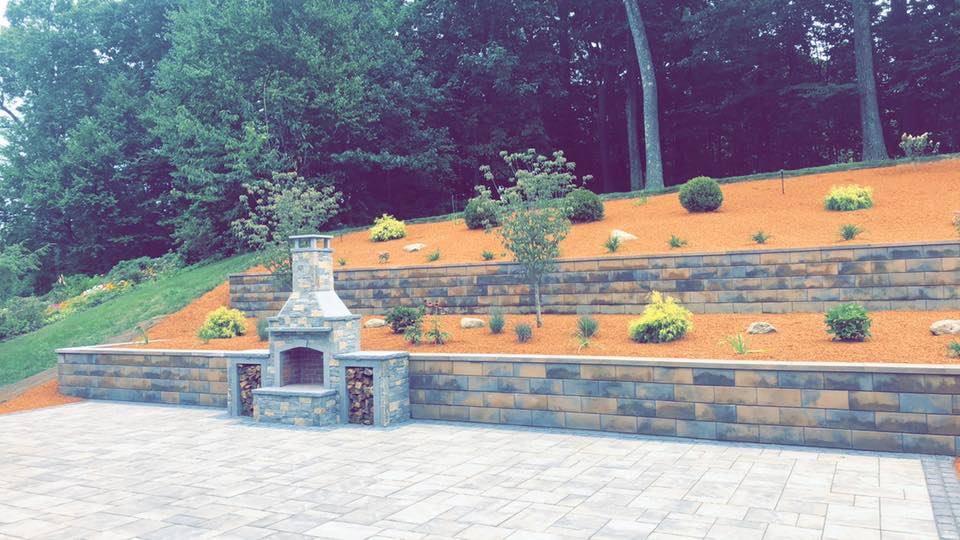Yard With Chimney In The Middle — Shrewsbury, MA — Warren Landscaping