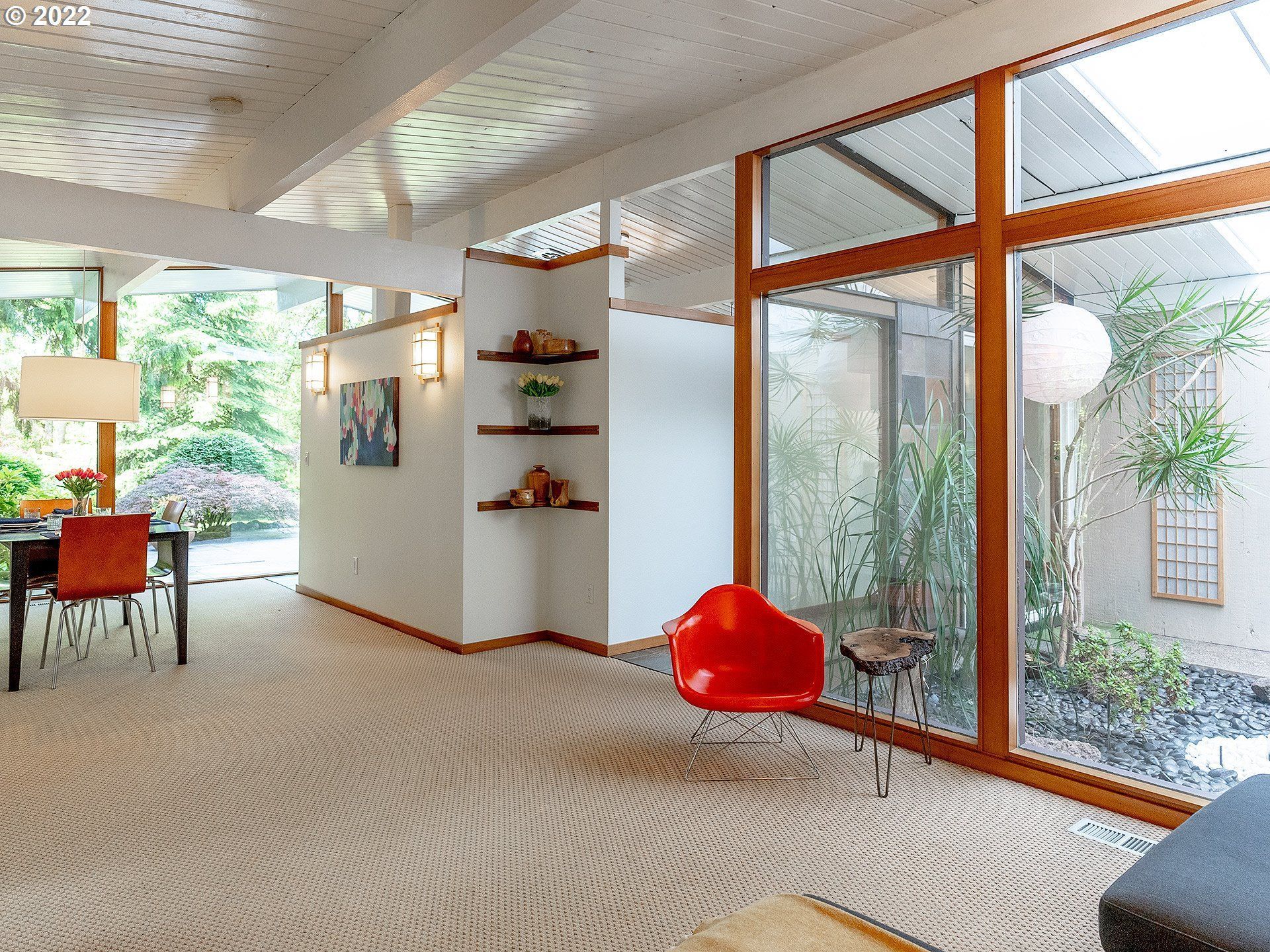 a post and beam construction interior of a mid-century modern home.