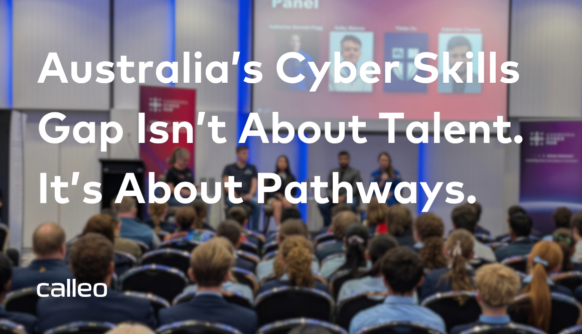 A panel of speakers on stage before an audience, with the text overlay: