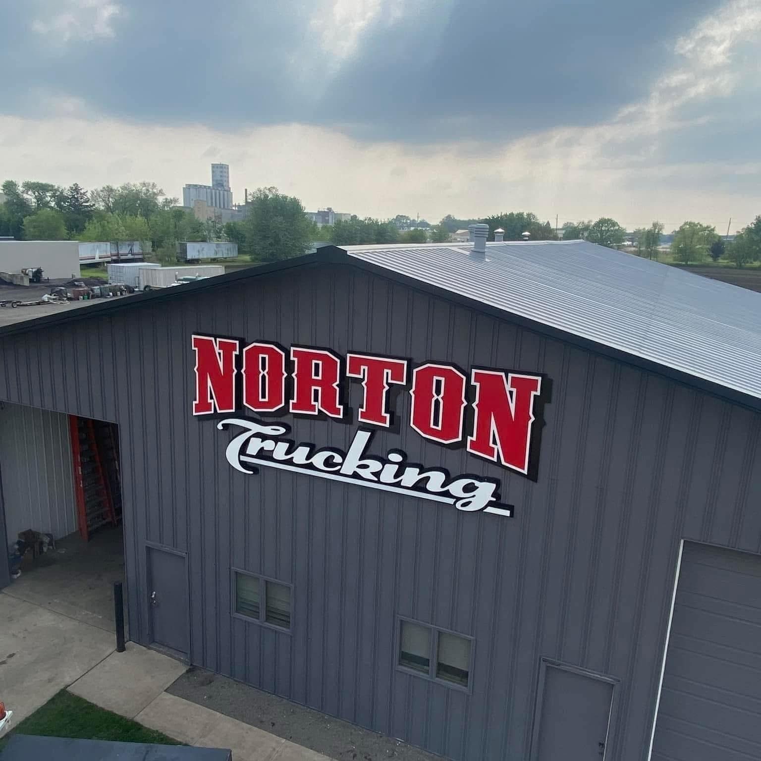 An aerial view of a norton trucking building