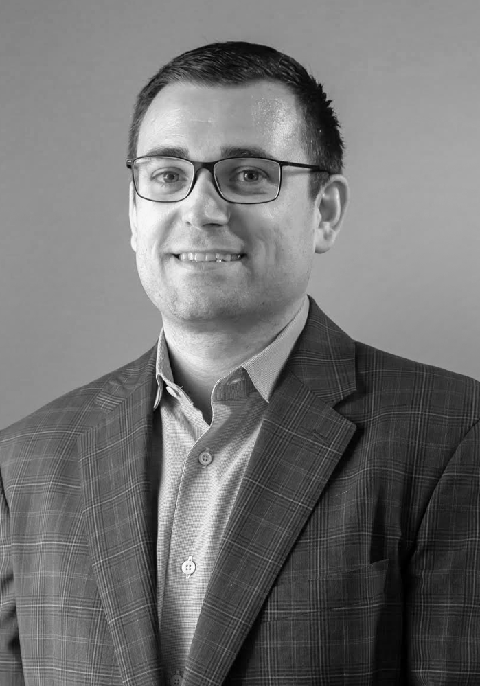 Headshot of Brian Robinson, an employee of Leading Edge Payments.