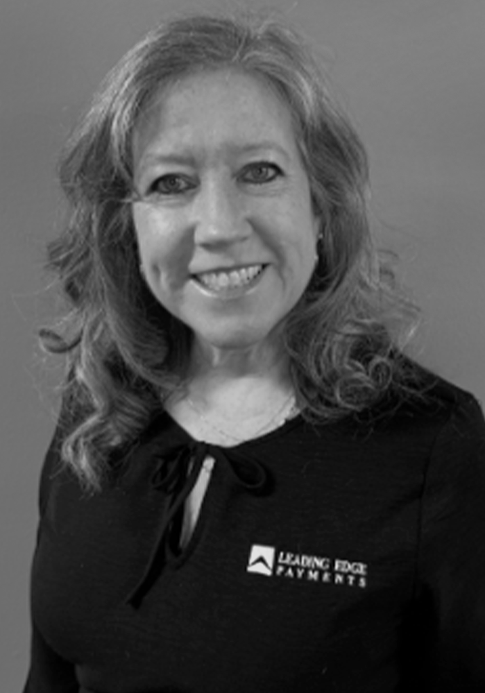 Headshot of Julie, an employee of Leading Edge Payments.