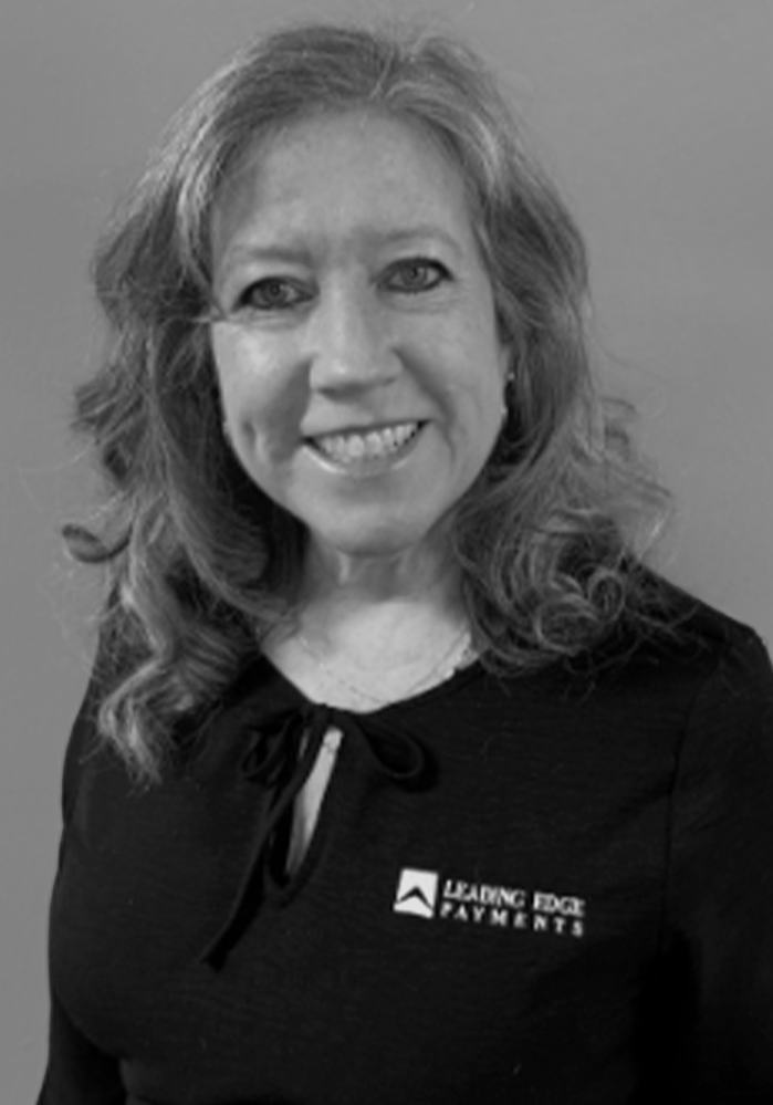 Headshot of Julie, an employee of Leading Edge Payments.
