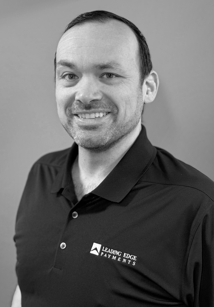 Headshot of Lee, an employee of Leading Edge Payments.