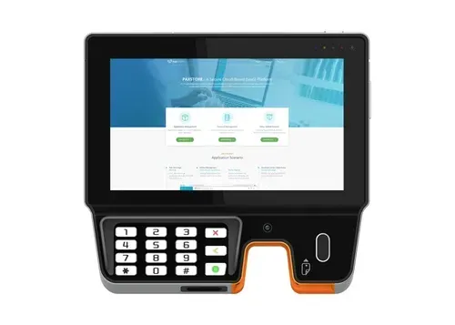 Point-of-sale device with touchscreen, keypad, and card reader. Black and orange design, displaying a website with icons.