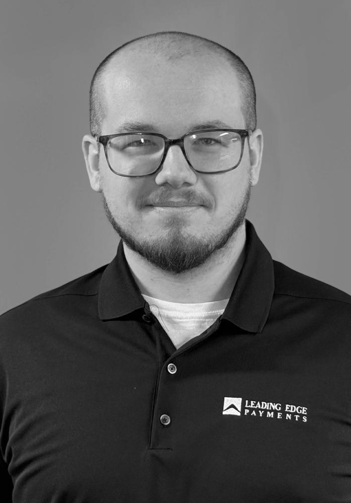 Headshot of Sam, an employee of Leading Edge Payments.