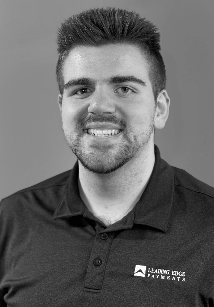 Headshot of Xander, an employee of Leading Edge Payments.